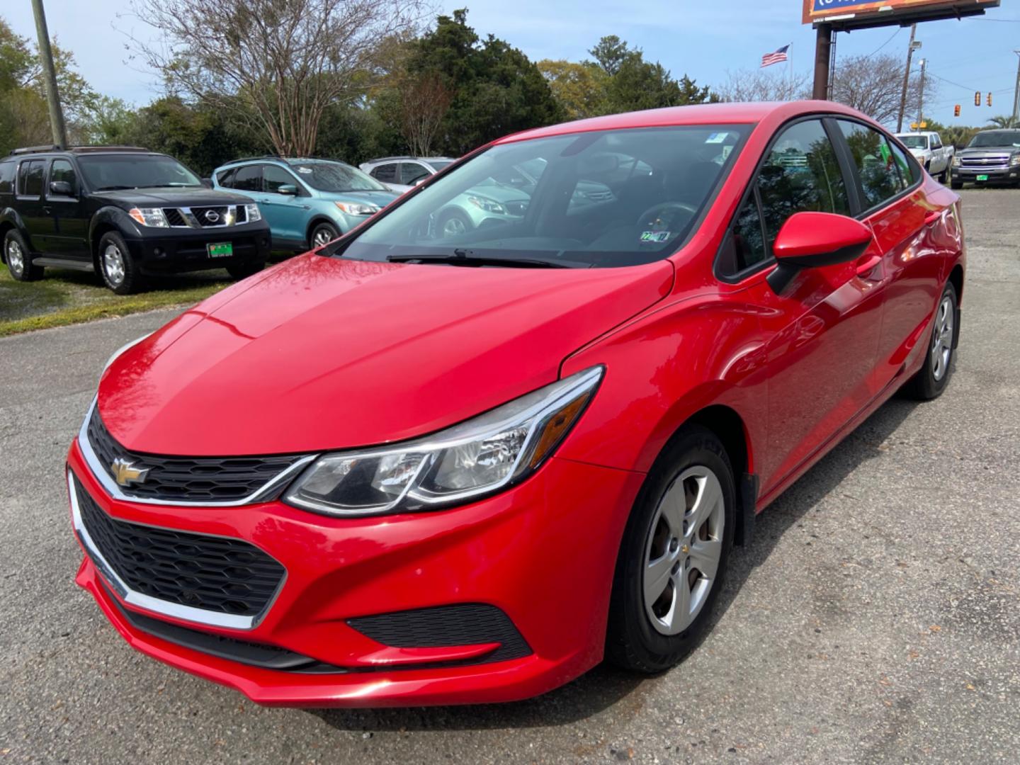 2016 RED CHEVROLET CRUZE LS AUTO (1G1BC5SM7G7) with an 1.4L engine, Automatic transmission, located at 5103 Dorchester Rd., Charleston, SC, 29418-5607, (843) 767-1122, 36.245171, -115.228050 - Photo#2